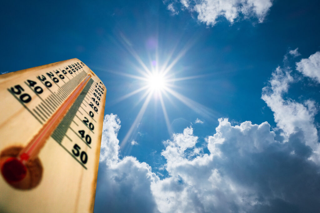 close up view of thermometer underneath hot sun outside