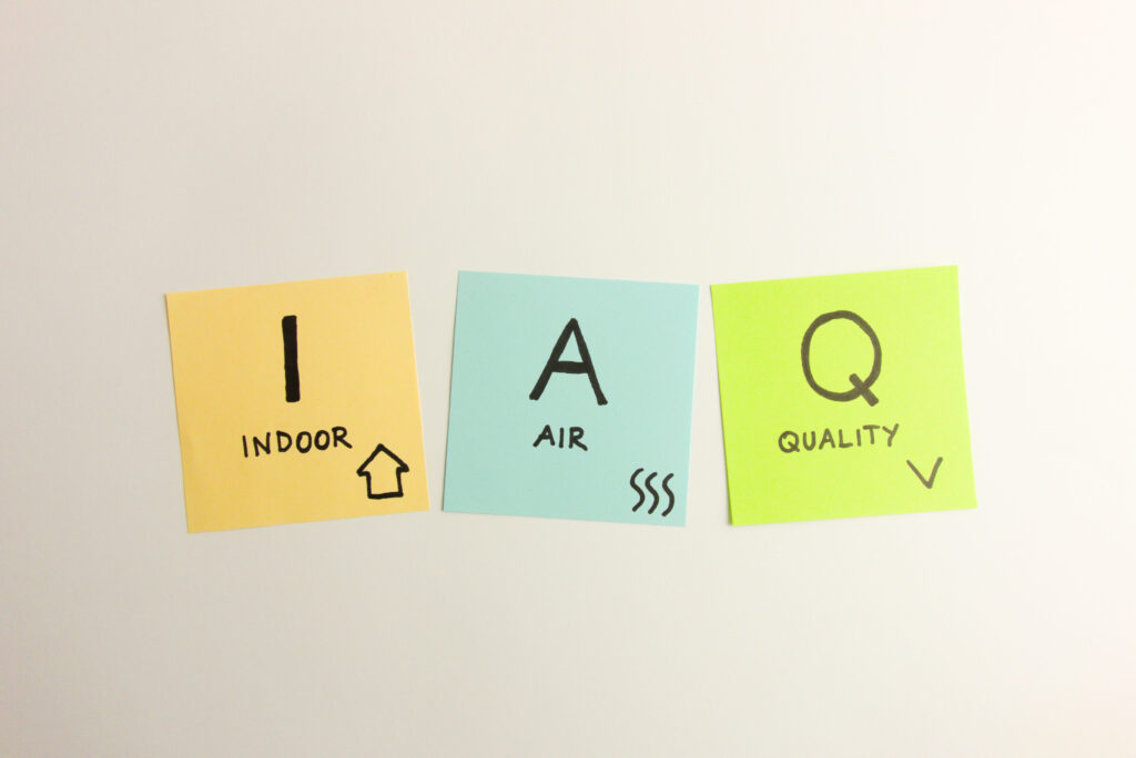three sticky notes with written indoor air quality
