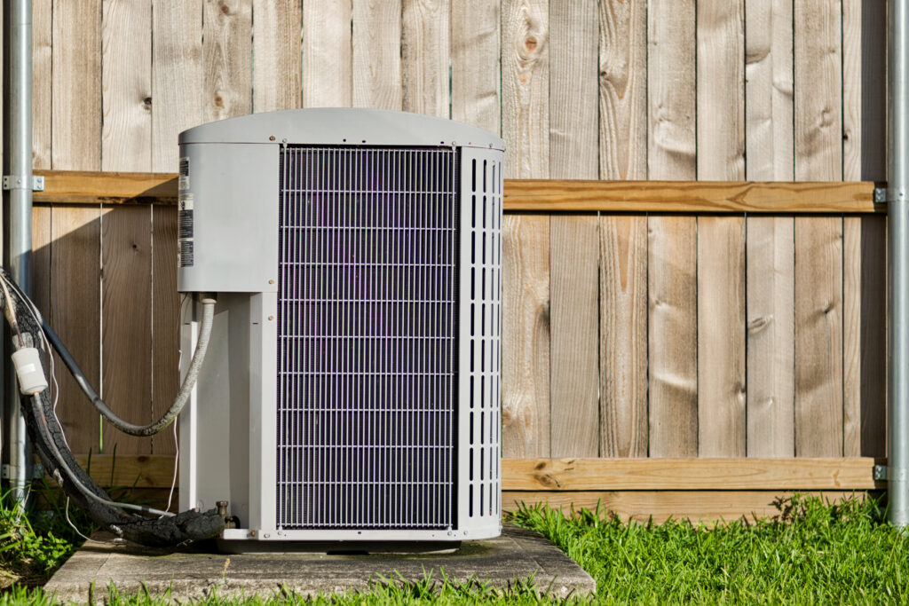 Newly installed AC unit outside a Grand Rapids home