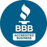Blue circular badge with a white torch icon above the words "BBB Accredited Business.