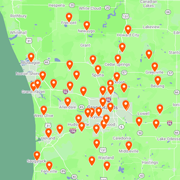 A map of West Michigan displays multiple red location markers clustered around Grand Rapids and the surrounding areas.